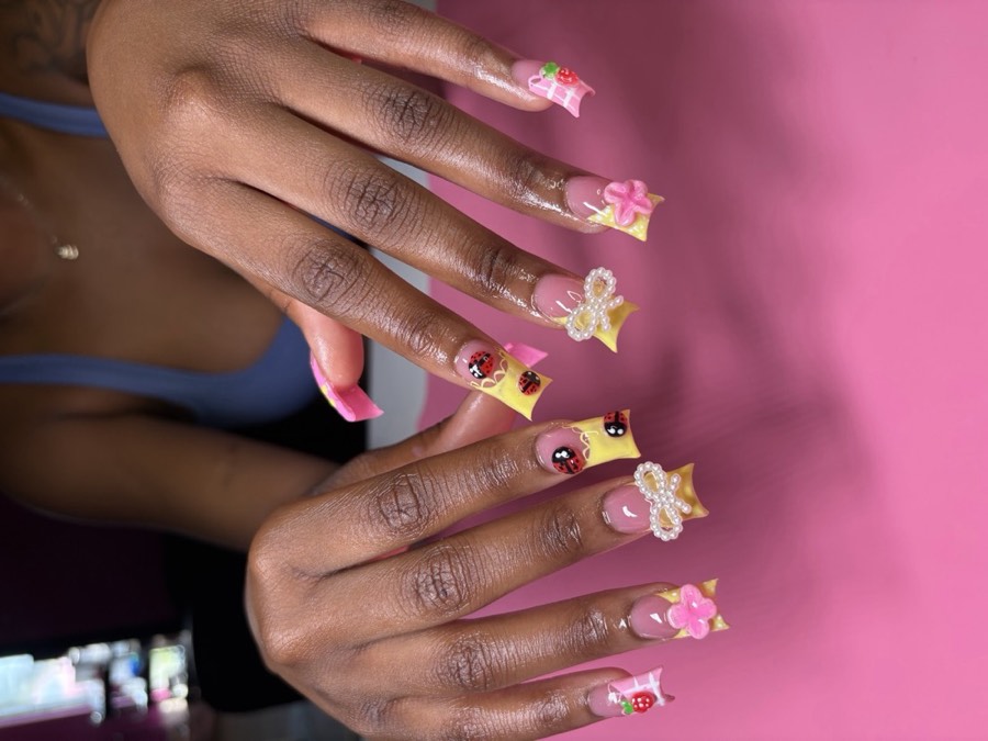 Nail sets, pedicures and lashes by Asia Marie