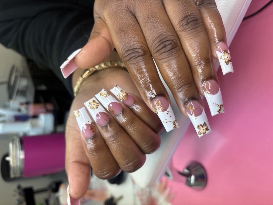 Nail sets, pedicures and lashes, work by Asia Marie