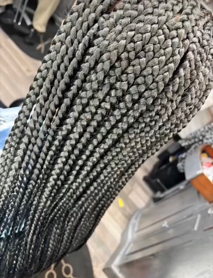 Braids, twists, locs and retwists. 149 styles on her menu by Krystal Smith-McCray